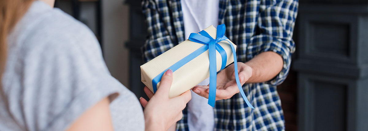 giving a gift to the host
